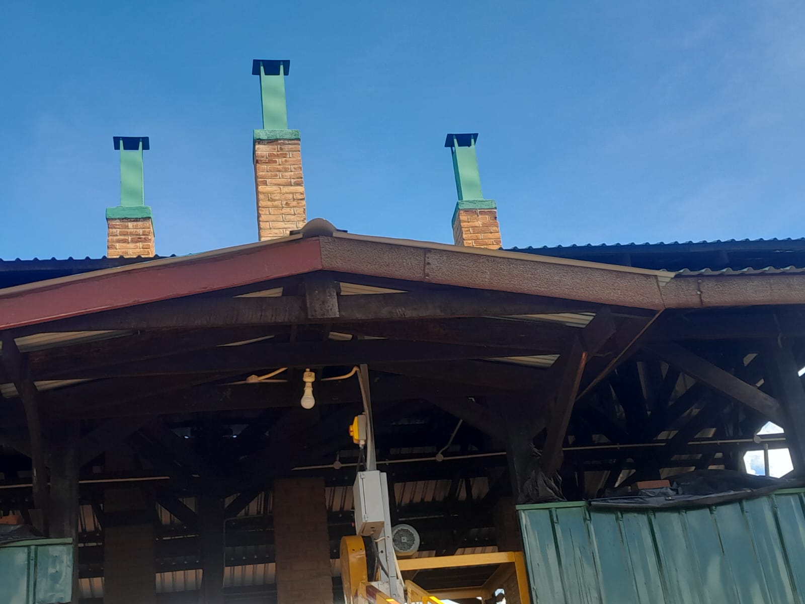 VSK kiln chimneys against blue sky